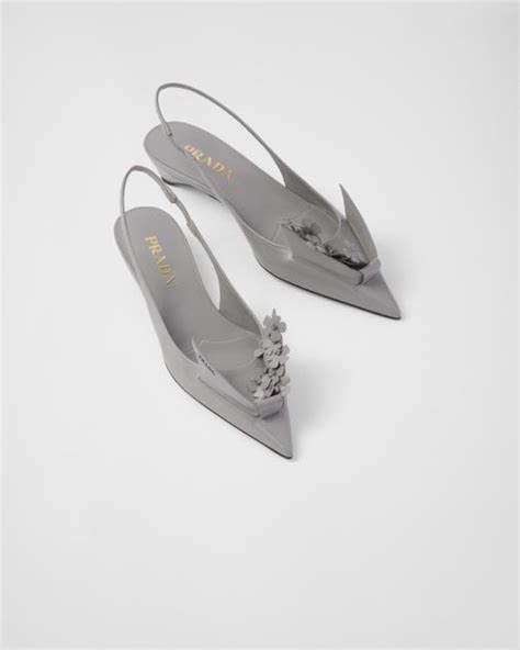 Brushed leather slingback pumps with floral appliques